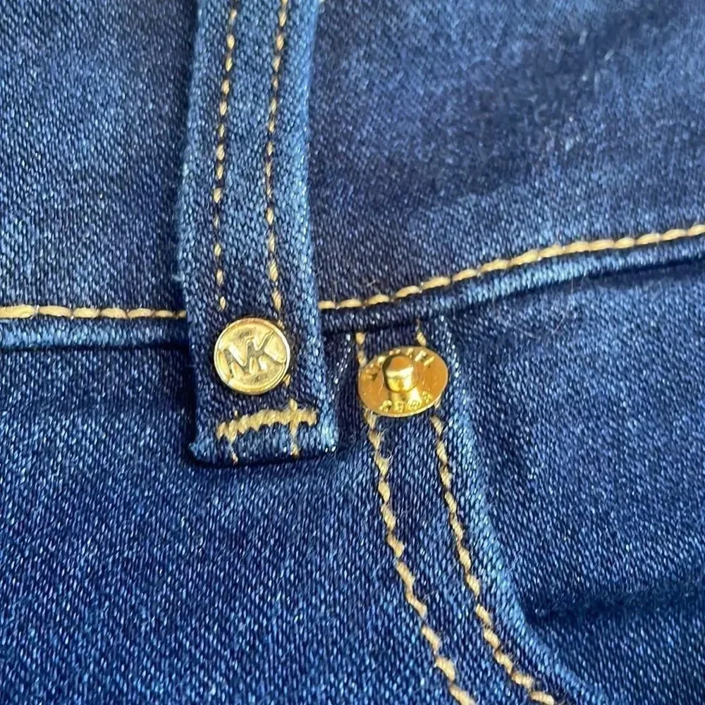Michael Kors woman’s dark blue jeans. They are a size 10